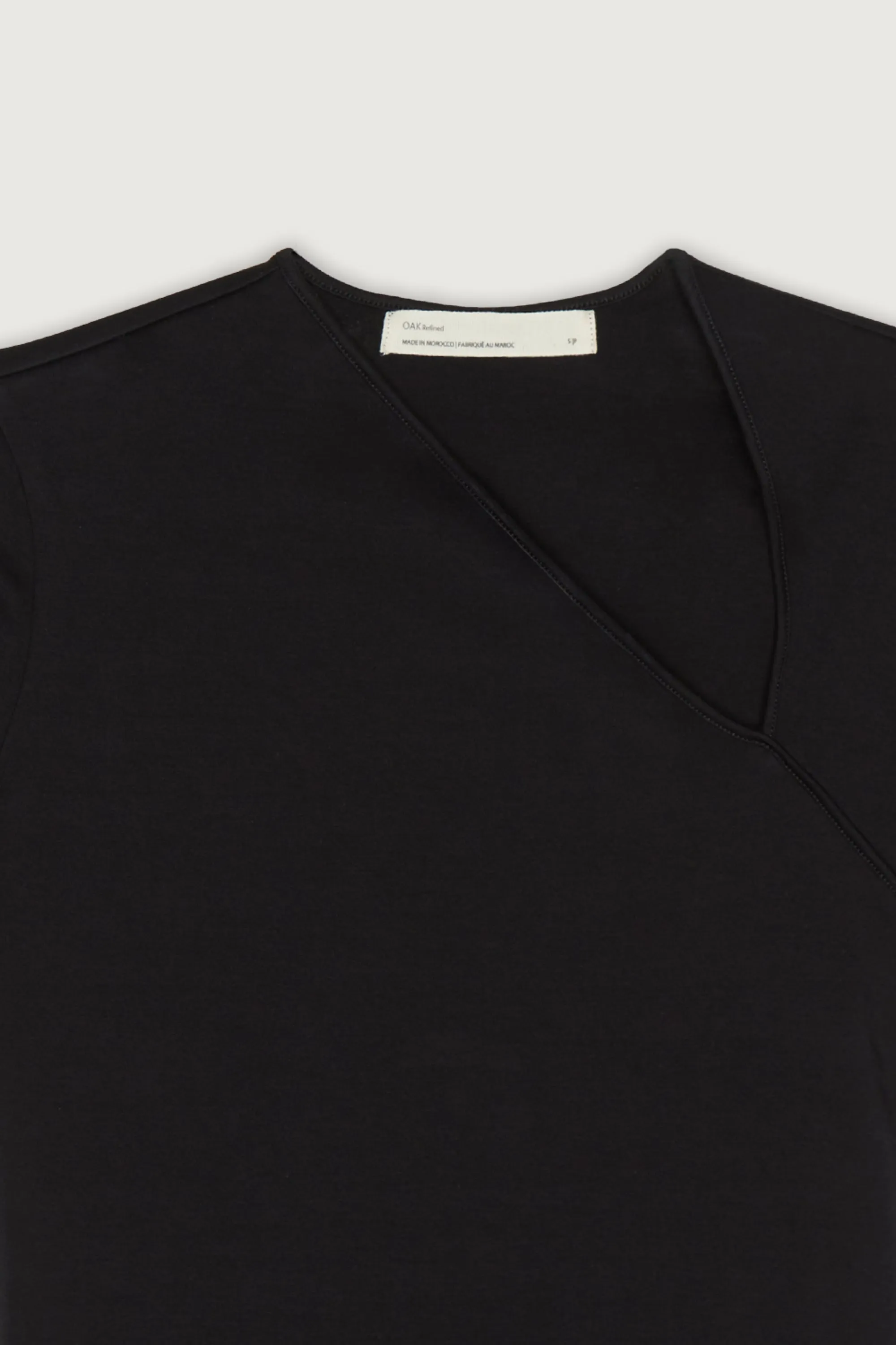 ASYMMETRICAL NECK TEE