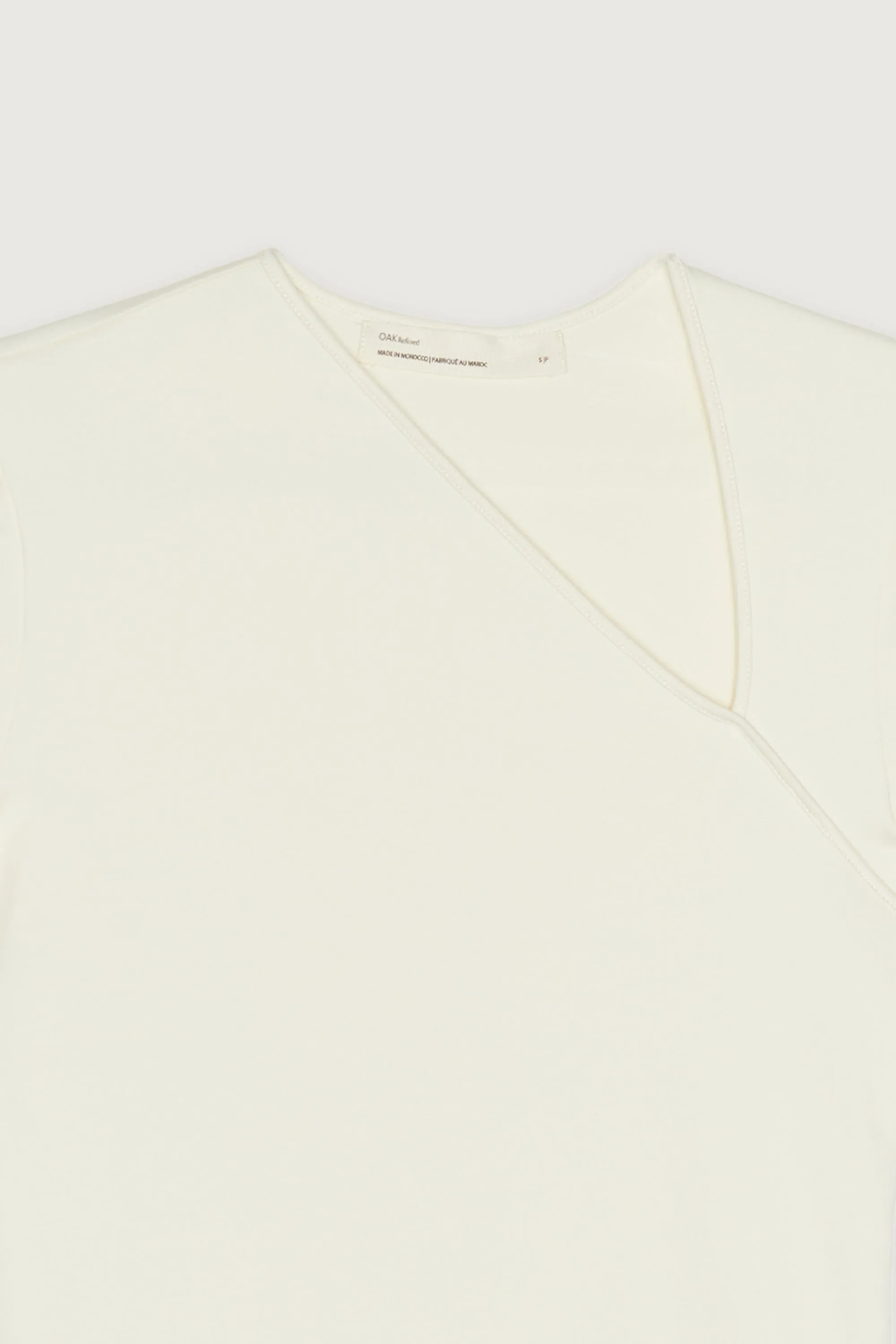 ASYMMETRICAL NECK TEE